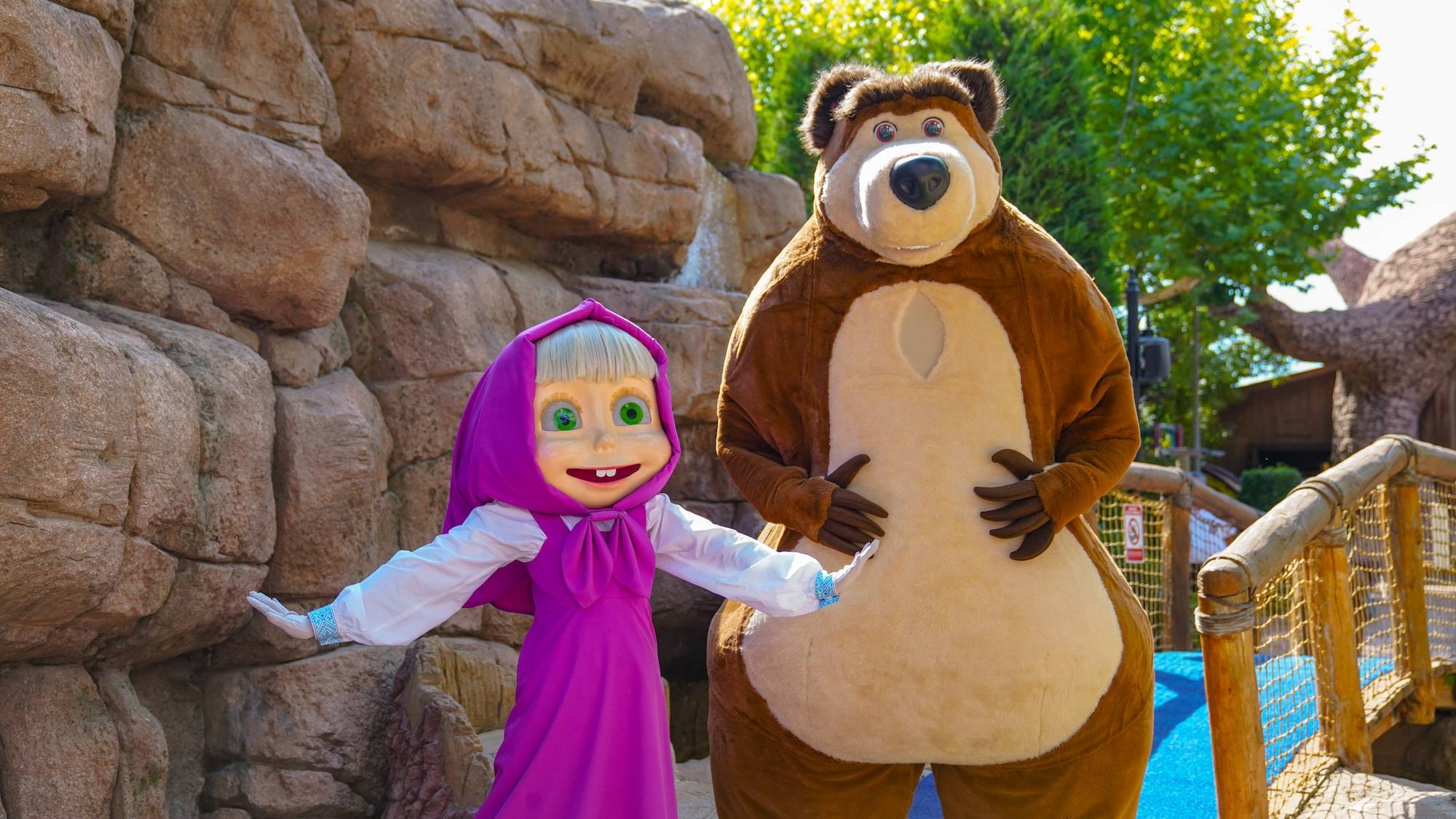 Masha and the Bear greeting guests during a meet and greet at The Land of Legends