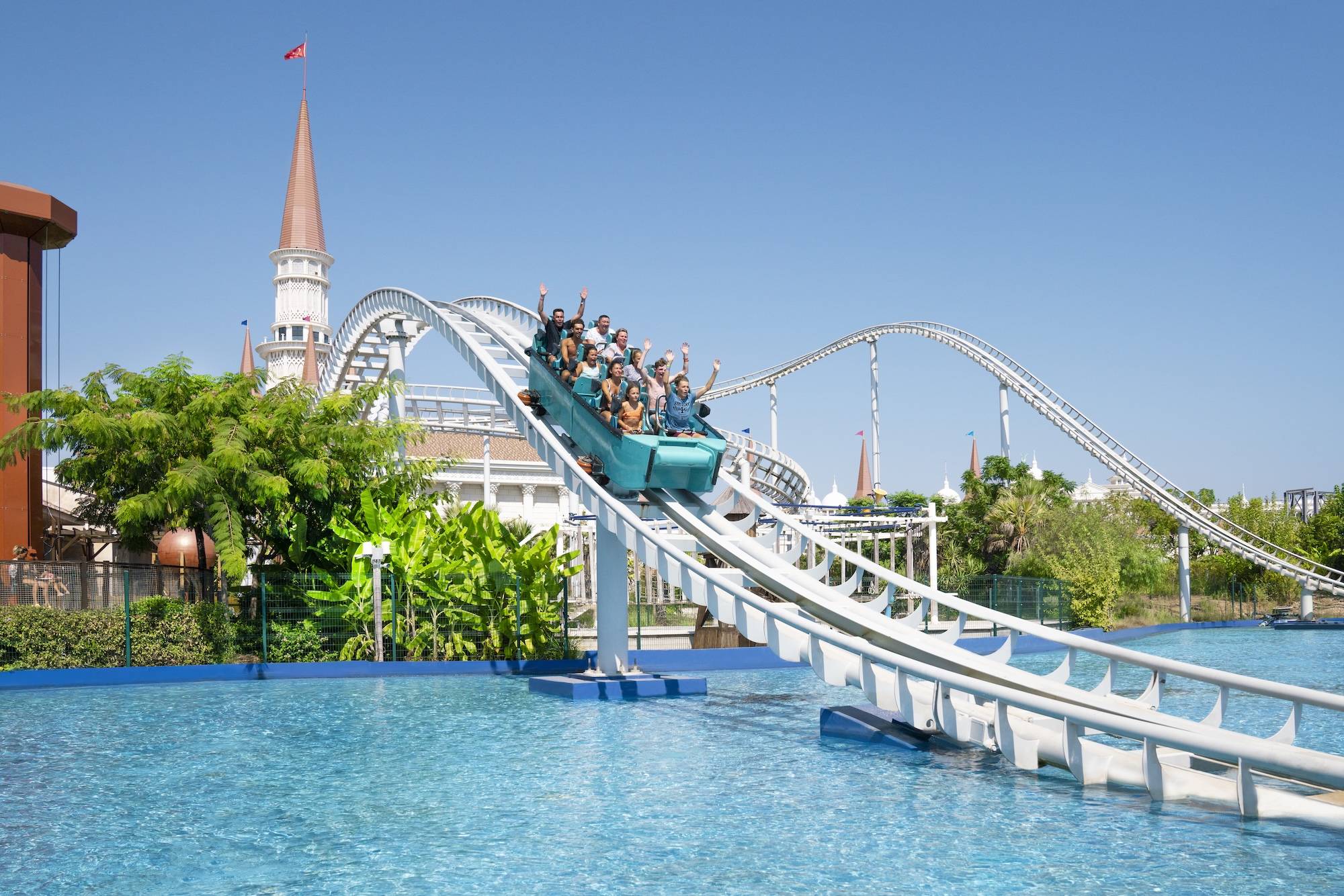 Guests riding the Typhoon Coaster at The Land of Legends theme park